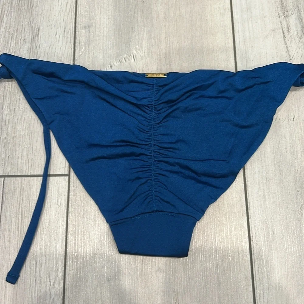 A. Che Jolie string ink blue swim bikini bottom size XS